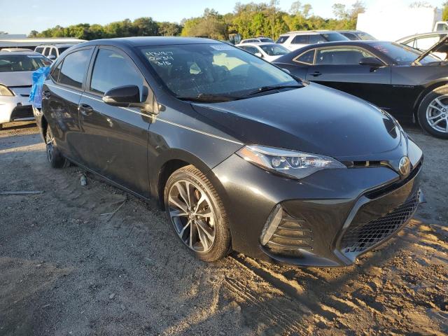 Photo 3 VIN: 5YFBURHE3KP880234 - TOYOTA COROLLA L 