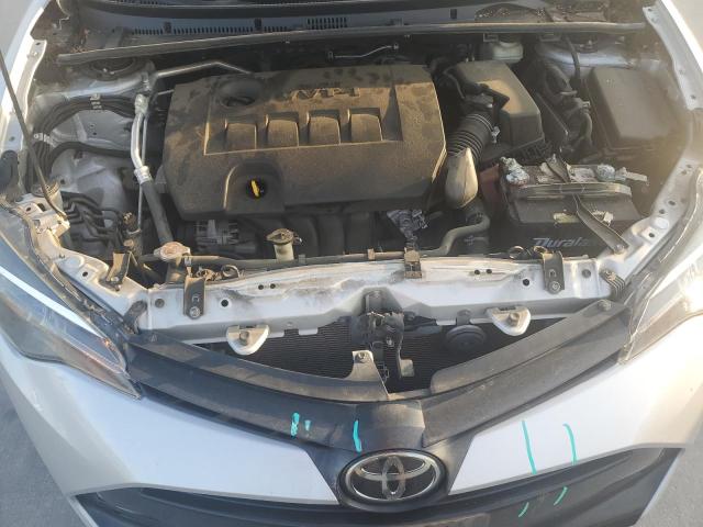 Photo 10 VIN: 5YFBURHE3KP880850 - TOYOTA COROLLA L 