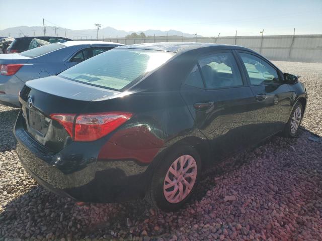 Photo 2 VIN: 5YFBURHE3KP883487 - TOYOTA COROLLA L 