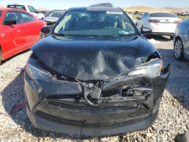 Photo 4 VIN: 5YFBURHE3KP883487 - TOYOTA COROLLA L 