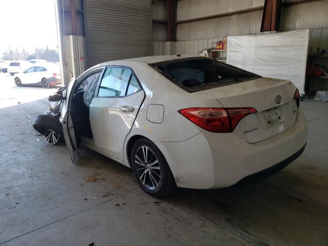 Photo 2 VIN: 5YFBURHE3KP883912 - TOYOTA COROLLA L 