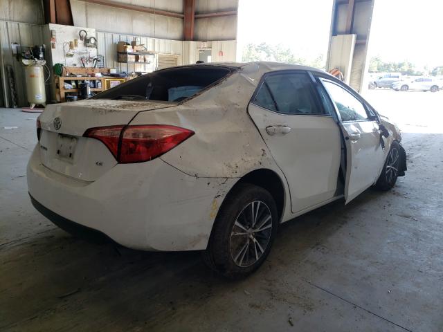 Photo 3 VIN: 5YFBURHE3KP883912 - TOYOTA COROLLA L 