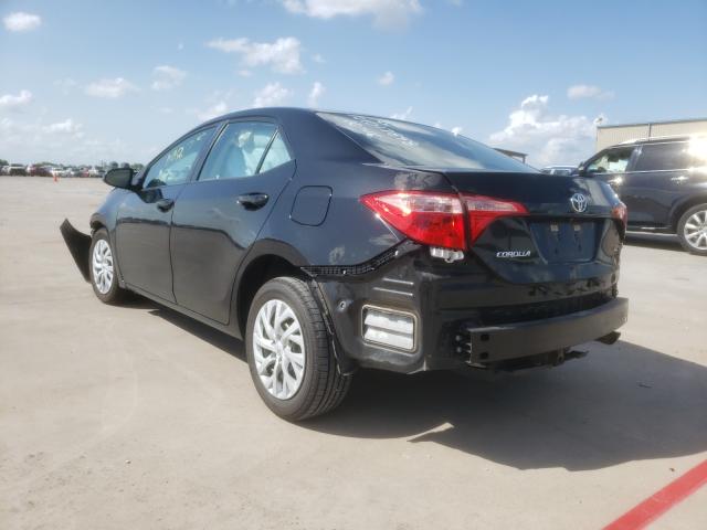 Photo 2 VIN: 5YFBURHE3KP884543 - TOYOTA COROLLA L 