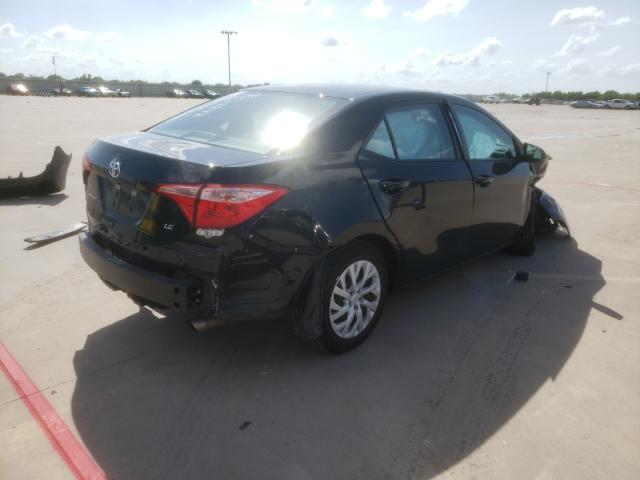 Photo 3 VIN: 5YFBURHE3KP884543 - TOYOTA COROLLA L 