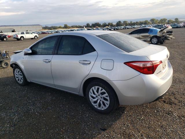 Photo 1 VIN: 5YFBURHE3KP884610 - TOYOTA COROLLA L 