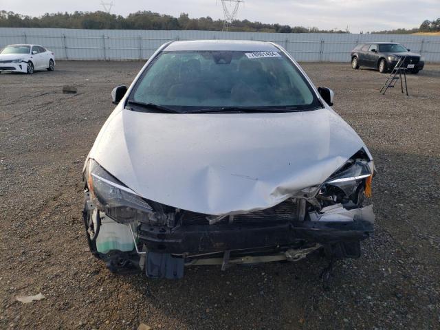 Photo 4 VIN: 5YFBURHE3KP884610 - TOYOTA COROLLA L 