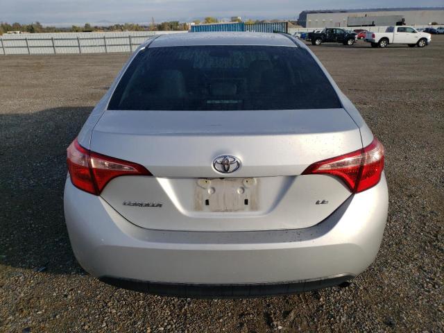 Photo 5 VIN: 5YFBURHE3KP884610 - TOYOTA COROLLA L 