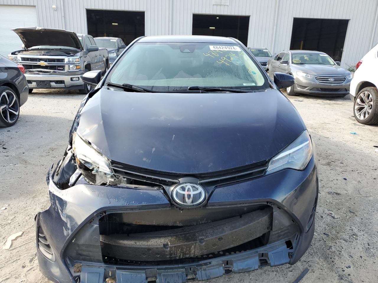 Photo 4 VIN: 5YFBURHE3KP885028 - TOYOTA COROLLA 