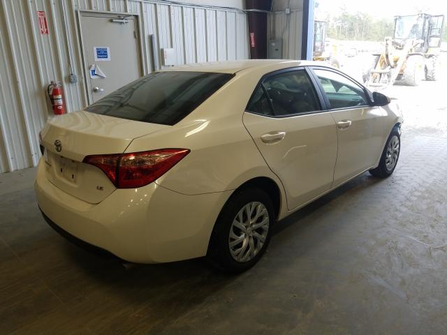 Photo 3 VIN: 5YFBURHE3KP886096 - TOYOTA COROLLA L 