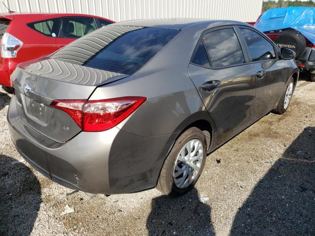 Photo 3 VIN: 5YFBURHE3KP887345 - TOYOTA COROLLA L 