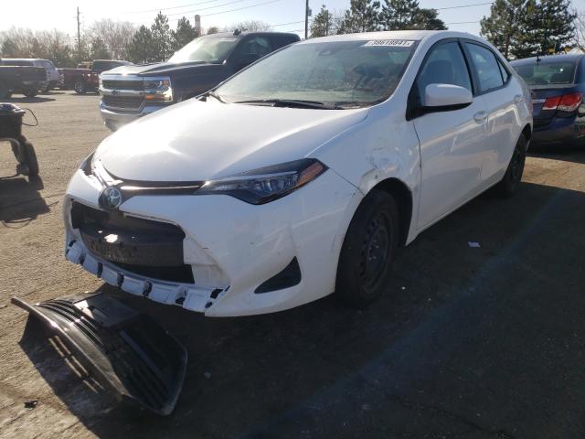 Photo 1 VIN: 5YFBURHE3KP887555 - TOYOTA COROLLA L 