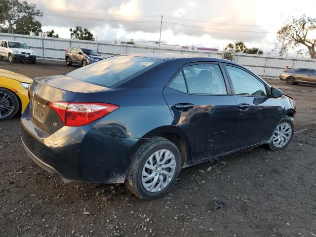 Photo 2 VIN: 5YFBURHE3KP890309 - TOYOTA COROLLA 