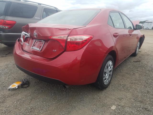 Photo 3 VIN: 5YFBURHE3KP894800 - TOYOTA COROLLA L 