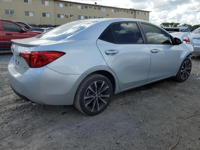 Photo 2 VIN: 5YFBURHE3KP896658 - TOYOTA COROLLA L 