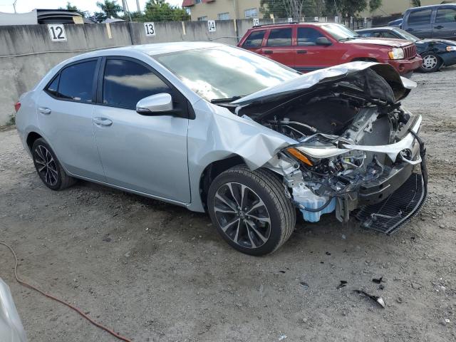 Photo 3 VIN: 5YFBURHE3KP896658 - TOYOTA COROLLA L 