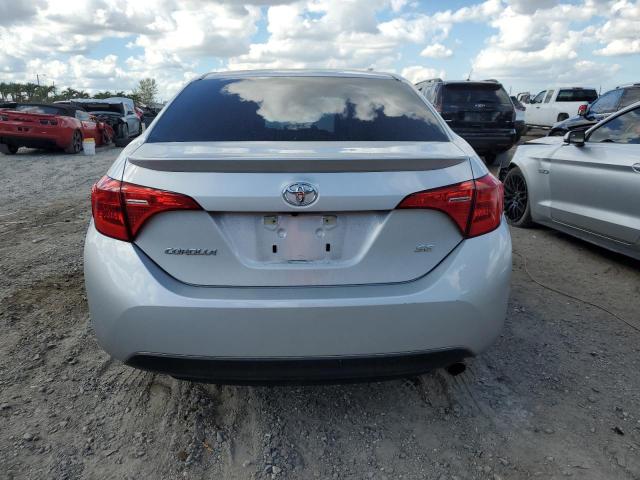 Photo 5 VIN: 5YFBURHE3KP896658 - TOYOTA COROLLA L 