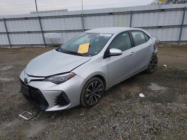 Photo 1 VIN: 5YFBURHE3KP897759 - TOYOTA COROLLA L 