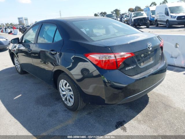 Photo 2 VIN: 5YFBURHE3KP897762 - TOYOTA COROLLA 