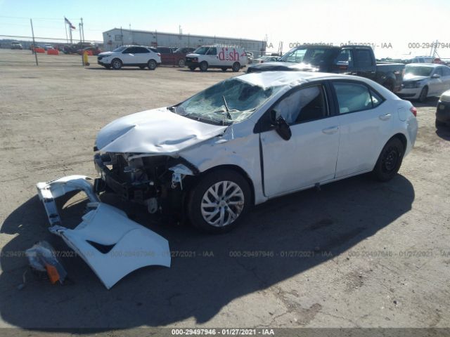 Photo 1 VIN: 5YFBURHE3KP898586 - TOYOTA COROLLA 