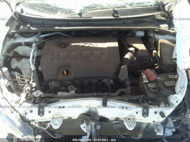 Photo 9 VIN: 5YFBURHE3KP898586 - TOYOTA COROLLA 