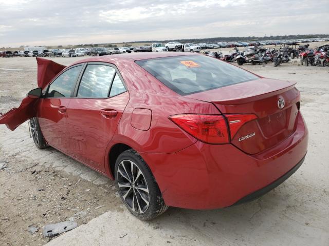 Photo 2 VIN: 5YFBURHE3KP899902 - TOYOTA COROLLA L 