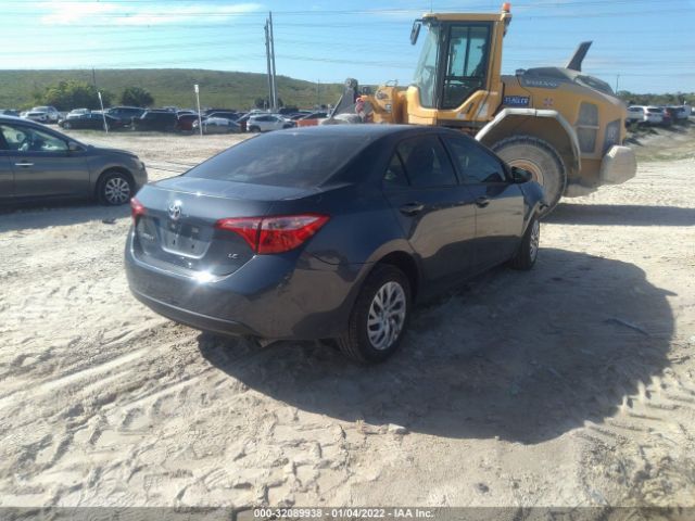 Photo 3 VIN: 5YFBURHE3KP901597 - TOYOTA COROLLA 