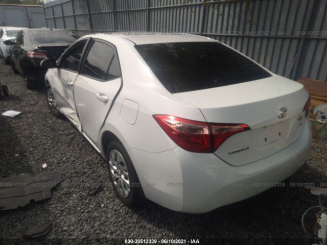 Photo 2 VIN: 5YFBURHE3KP903351 - TOYOTA COROLLA 