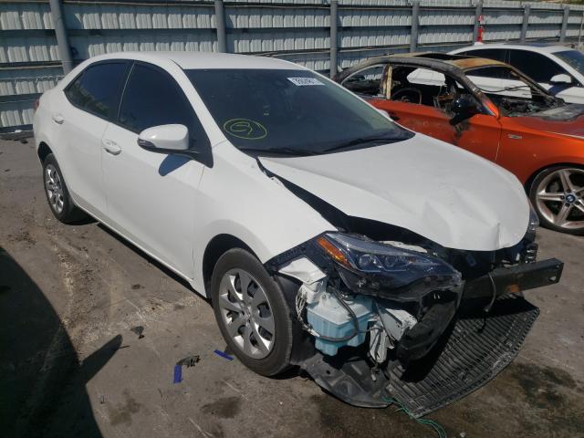 Photo 0 VIN: 5YFBURHE3KP908095 - TOYOTA COROLLA L 