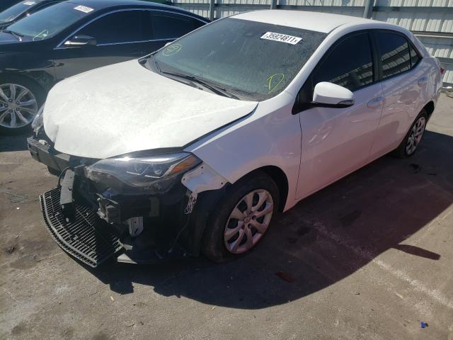 Photo 1 VIN: 5YFBURHE3KP908095 - TOYOTA COROLLA L 