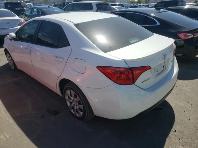 Photo 2 VIN: 5YFBURHE3KP908095 - TOYOTA COROLLA L 