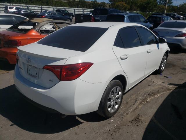 Photo 3 VIN: 5YFBURHE3KP908095 - TOYOTA COROLLA L 