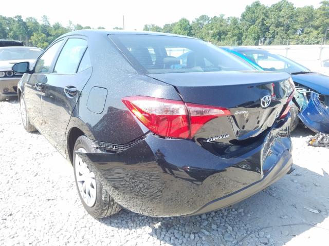 Photo 2 VIN: 5YFBURHE3KP912390 - TOYOTA COROLLA L 