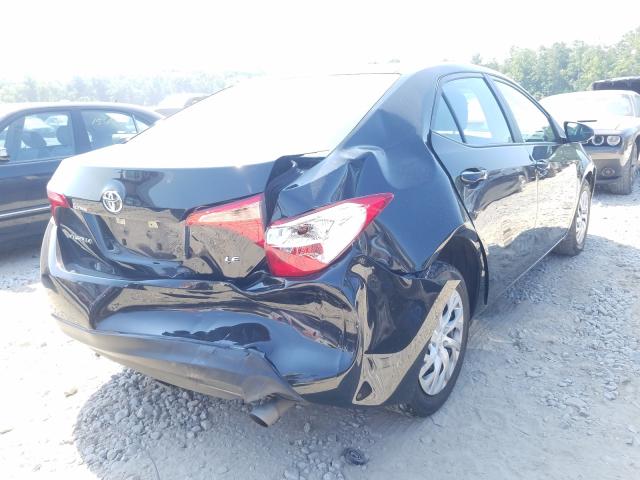 Photo 3 VIN: 5YFBURHE3KP912390 - TOYOTA COROLLA L 