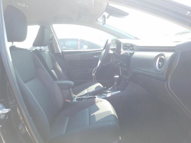 Photo 4 VIN: 5YFBURHE3KP912390 - TOYOTA COROLLA L 