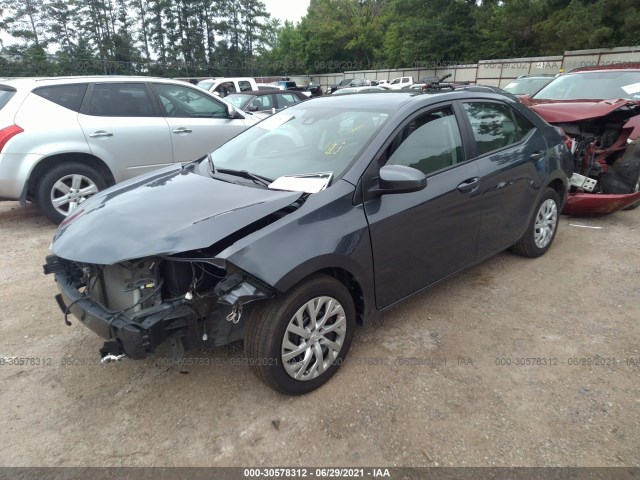 Photo 1 VIN: 5YFBURHE3KP916682 - TOYOTA COROLLA 