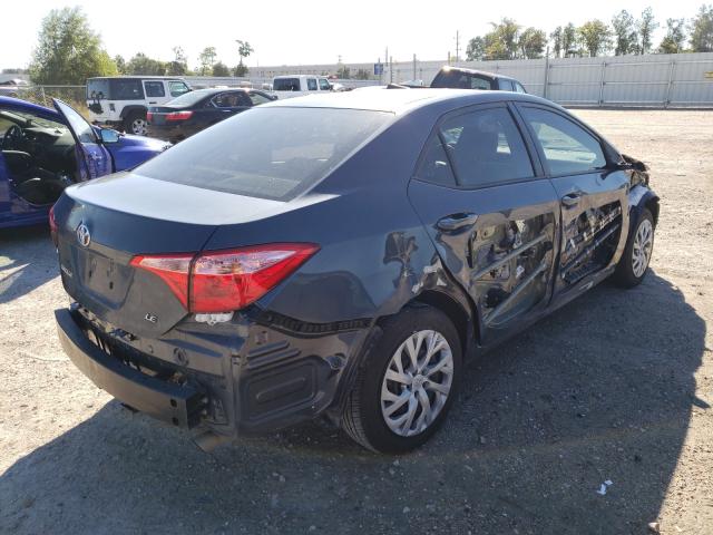 Photo 3 VIN: 5YFBURHE3KP918917 - TOYOTA COROLLA L 