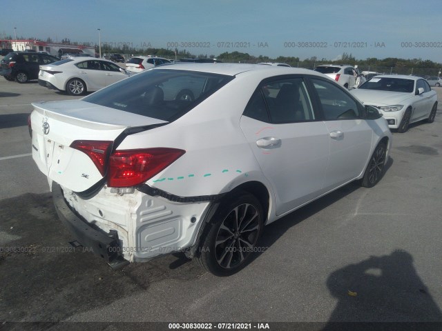 Photo 3 VIN: 5YFBURHE3KP920294 - TOYOTA COROLLA 