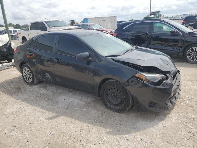 Photo 3 VIN: 5YFBURHE3KP940903 - TOYOTA COROLLA L 