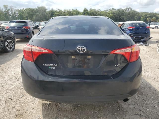 Photo 5 VIN: 5YFBURHE3KP940903 - TOYOTA COROLLA L 