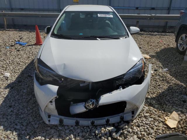 Photo 4 VIN: 5YFBURHE3KP941159 - TOYOTA COROLLA L 