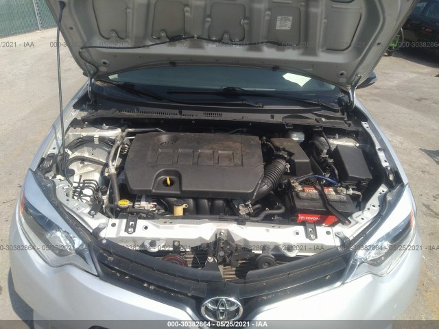 Photo 9 VIN: 5YFBURHE4EP033663 - TOYOTA COROLLA 