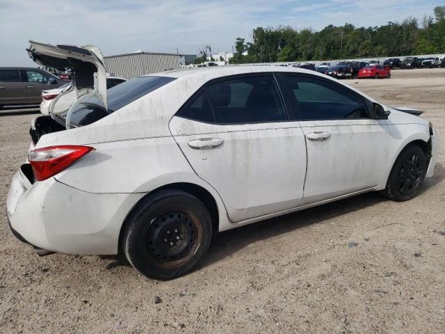 Photo 2 VIN: 5YFBURHE4GP393664 - TOYOTA COROLLA L 