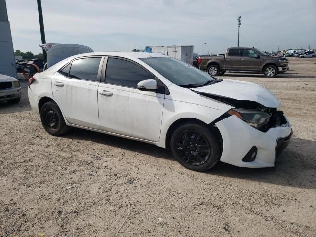 Photo 3 VIN: 5YFBURHE4GP393664 - TOYOTA COROLLA L 