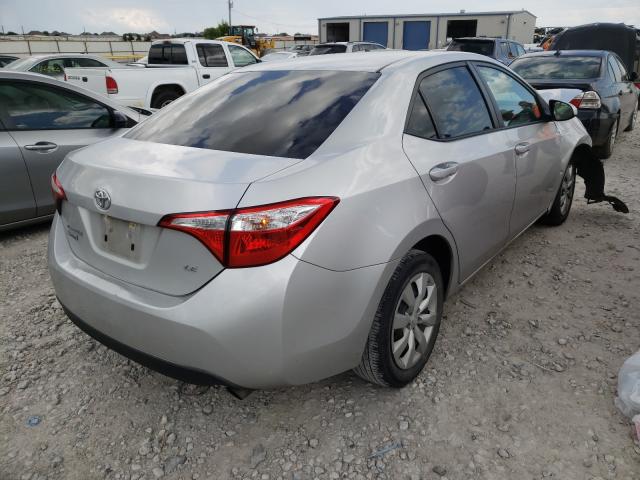 Photo 3 VIN: 5YFBURHE4GP424802 - TOYOTA COROLLA L 