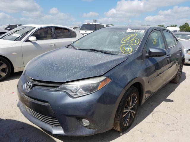 Photo 1 VIN: 5YFBURHE4GP476866 - TOYOTA COROLLA L 