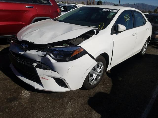 Photo 1 VIN: 5YFBURHE4GP504214 - TOYOTA COROLLA L 