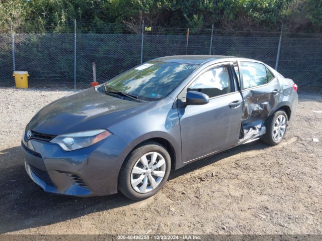 Photo 1 VIN: 5YFBURHE4GP553106 - TOYOTA COROLLA 