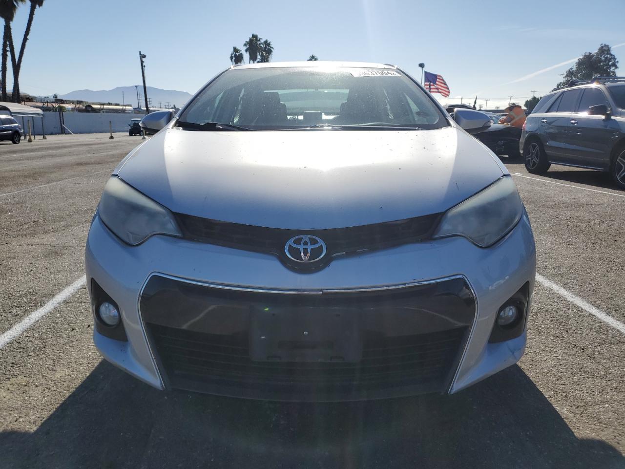 Photo 4 VIN: 5YFBURHE4GP557799 - TOYOTA COROLLA 