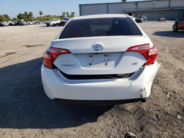 Photo 5 VIN: 5YFBURHE4HP601639 - TOYOTA COROLLA L 