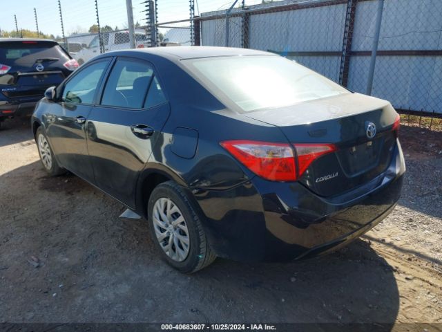 Photo 2 VIN: 5YFBURHE4HP646063 - TOYOTA COROLLA 